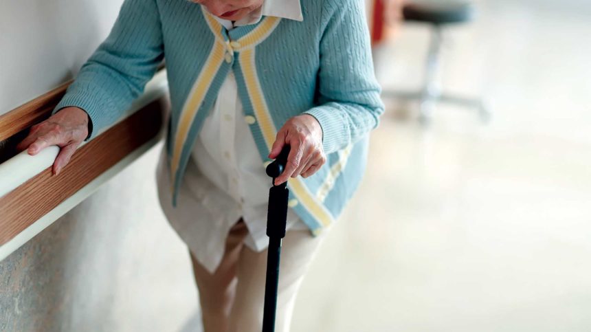 Senior using cane