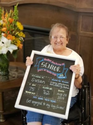 Nursing home residents pose for ‘back to school’ pictures
