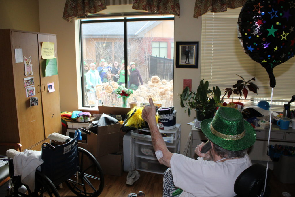 Family throws birthday bash outside of Minnesota resident’s window