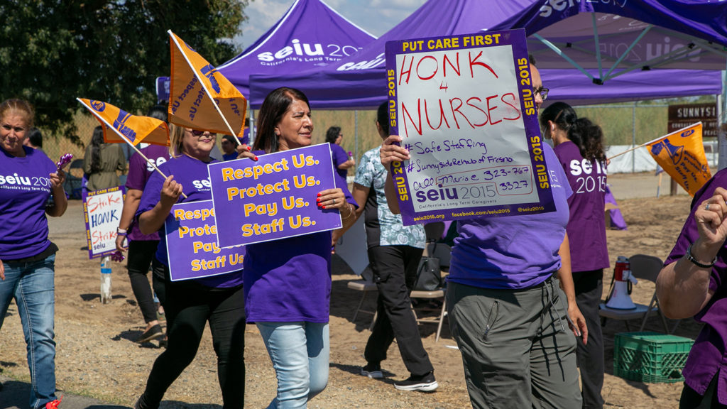 Nursing home workers end 6-week strike, get minimum medical wage and 1-year deal